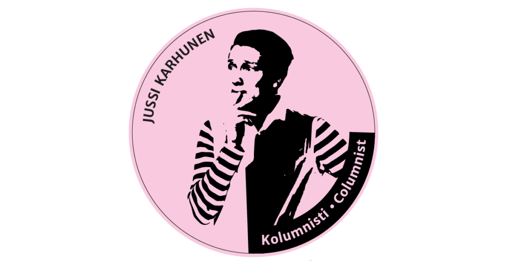 Kirjoittaja katsoo vasemmalle käsi huulilla ja pohtii