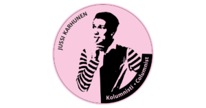 Kirjoittaja katsoo vasemmalle käsi huulilla ja pohtii